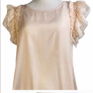 Pretty peach with pearls top.